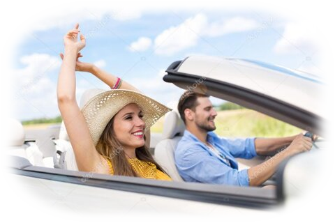 Couple in a Mercedes SLK on a scenic Swiss alpine road